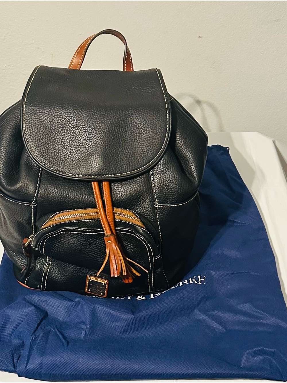 Dooney & Bourke Black Leather Backpack with Brown Trim